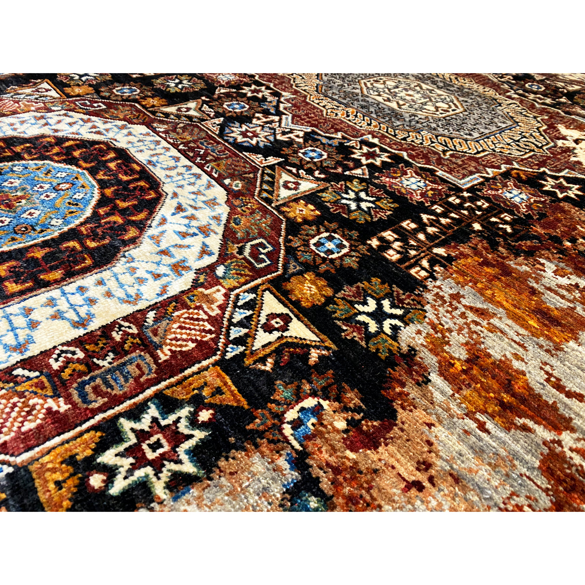 Mamluk-tapijt 184x124 cm detailopname: geometrische ornamenten in aardetinten en blauw