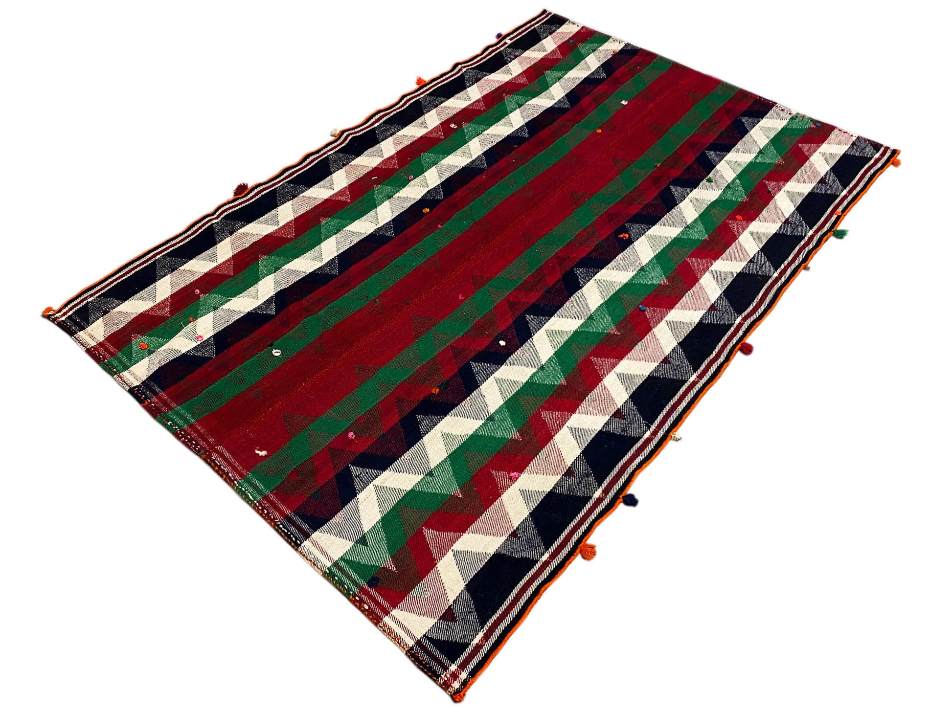 Wohnzimmer lebendiger Jajim Teppich handgefertigt im geometrischen Stil