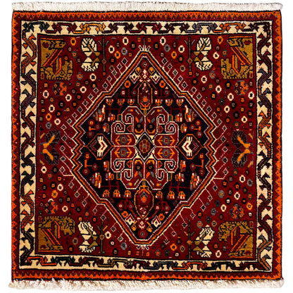 Poshti-tapijt 60x60 cm, rood patroon met oranje rand en franjes
