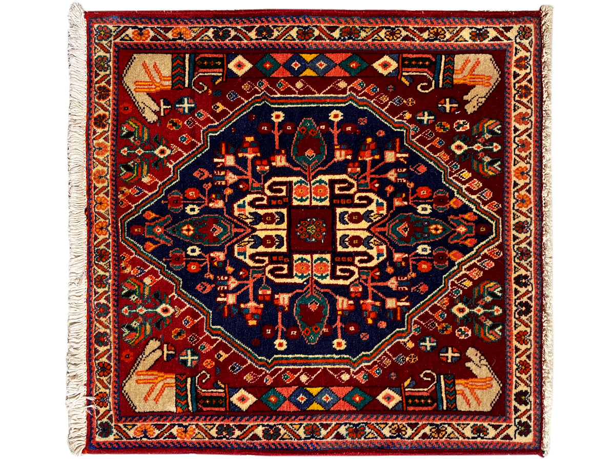 Poshti-tapijt 64x64 cm, vierkant, donkerblauw centraal medaillon, kleurrijke ornamenten, franjes