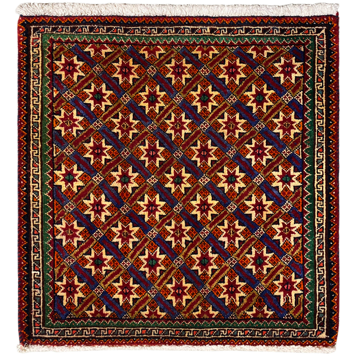 Poshti-vloerkleed 62x52 cm met geometrisch patroon, meerkleurig en franjes.
