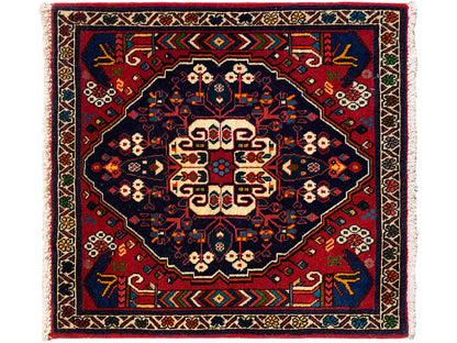 Tapijt met vierkant medaillon, blauw-rood patroon en crèmekleurige accenten, franjesrand