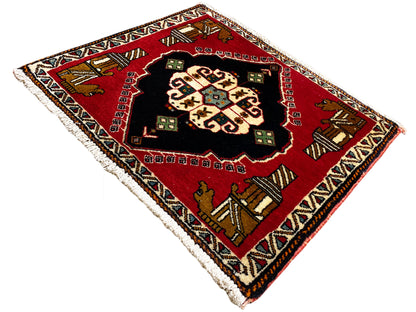 Poshti-vloerkleed 63x55 cm: rood vloerkleed met zwart medaillon, kleurrijke motieven in de hoeken, franjes
