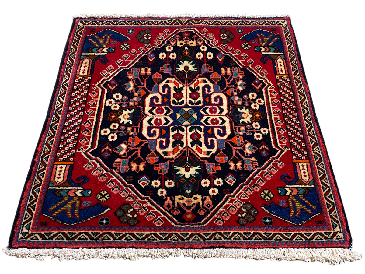 Poshti-tapijt 66x63 cm, donkerblauw/rood, medaillonpatroon met franjes aan de rand