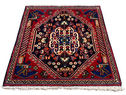 Poshti-tapijt 66x63 cm, donkerblauw/rood, medaillonpatroon met franjes aan de rand