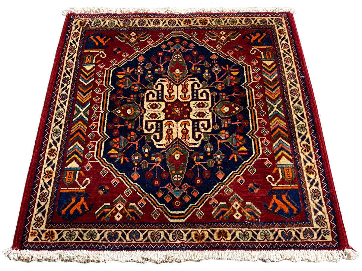 Tapijt 63x60 cm, rechthoekig, donkerblauw midden met kleurrijke sierlijst