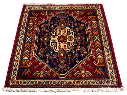 Tapijt 63x60 cm, rechthoekig, donkerblauw midden met kleurrijke sierlijst