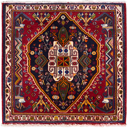 Poshti-tapijt (67×67 cm) met donkere basis, rand en geometrisch medaillon