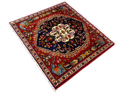 Poshti-tapijt 65x61 cm, diagonale weergave: rood veld met donker patroon en randornamenten