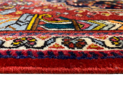 Poshti-tapijt 65x61 cm close-up van de rand: rode, blauwe en veelkleurige ornamenten
