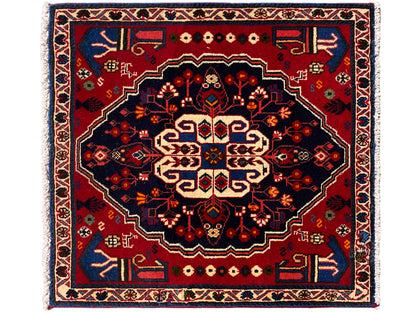Tapijt in rood en donkerblauw met groot centraal ornament, vierkant, 68x64 cm